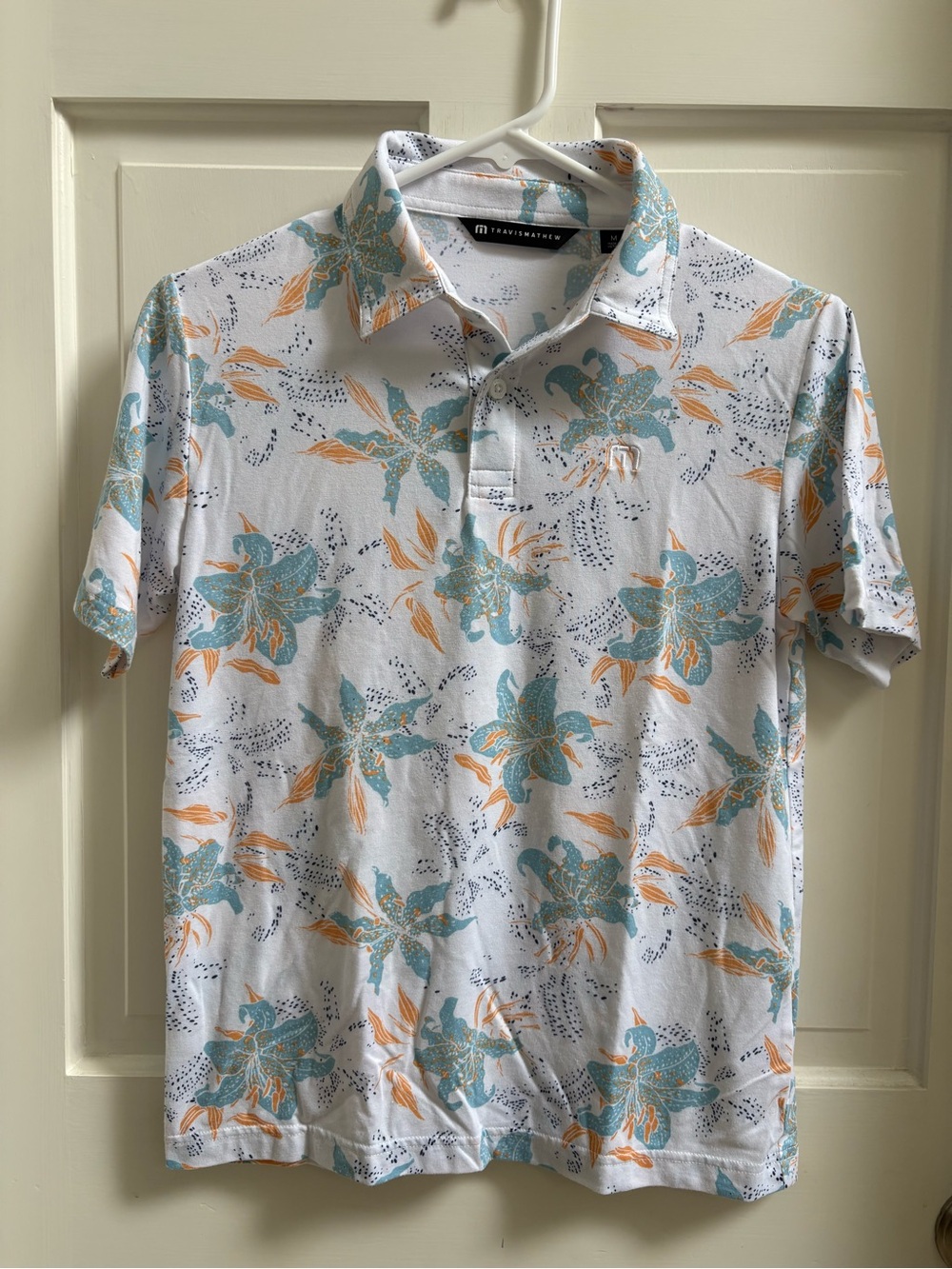Travis Mathew White Polo with Teal & Orange Floral Print